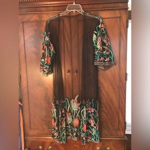 Size M bathing suit coverup.